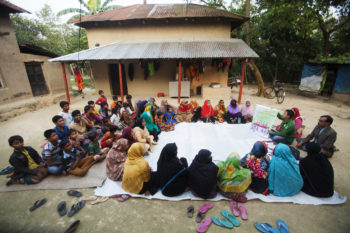 VCA facilitating courtyard session for raising awareness of community people