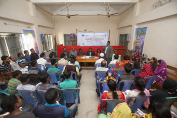 Participants of a community sharing meeting at union level express their interest and commitments to make village courts functional with their active involvement at various levels