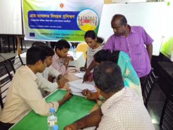 Group work session of UP representatives at the training on village courts